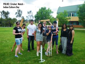 Dr Yamini Narayanan with La Trobe University Albury-Wodonga politics students at their Indian culture day cricket match.