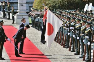 Tony Abbott with Japanese PM Shinzo Abe in front of honour guard, Tokyo, 7th April 2014